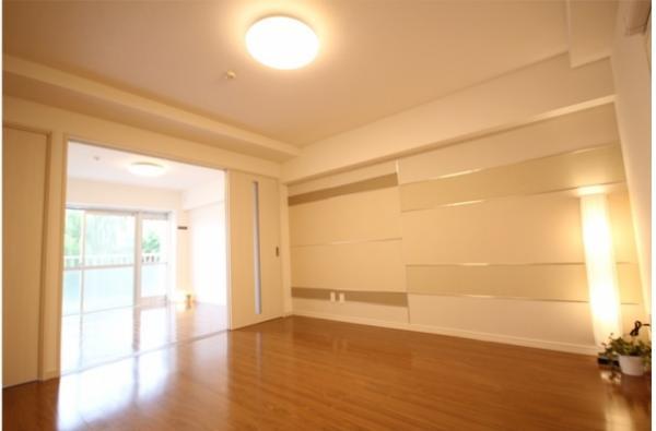 Living. Sliding door through the light even while closed Accent cross on the wall one side Interior of calm texture chic