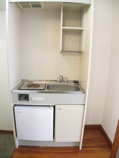 Kitchen. There is space put a shelf in the kitchen next to ☆