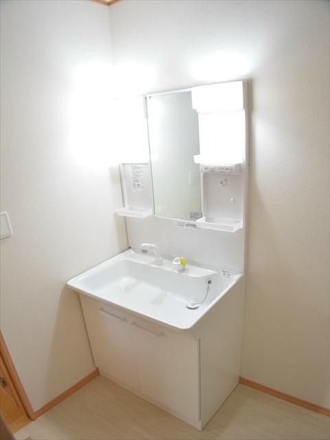 Wash basin, toilet. Wash basin with a shower