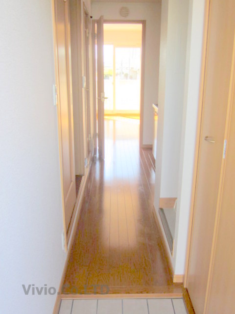 Entrance. Kitchen is the front of the hallway