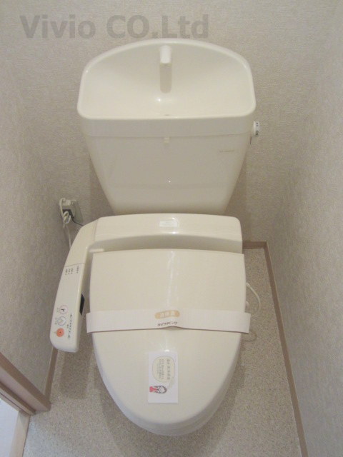 Toilet. Washlet is with