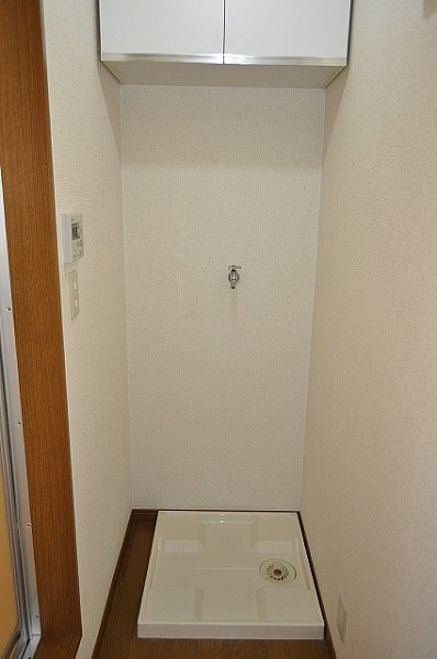 Other Equipment. Washing machine in the room