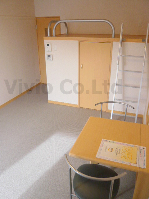 Living and room. High is a bed.