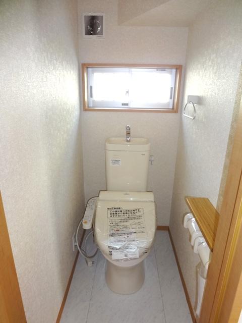 Toilet. Warm water washing toilet seat