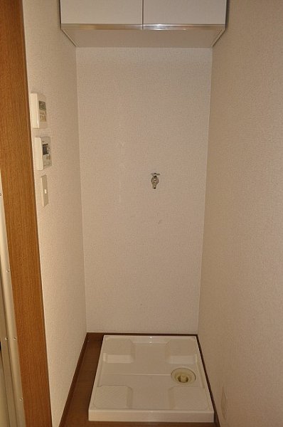 Other Equipment. Washing machine in the room