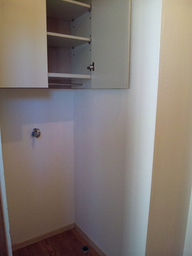 Other Equipment. Washing machine in the room