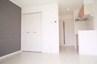 Living and room. Room accent wall one side is cross