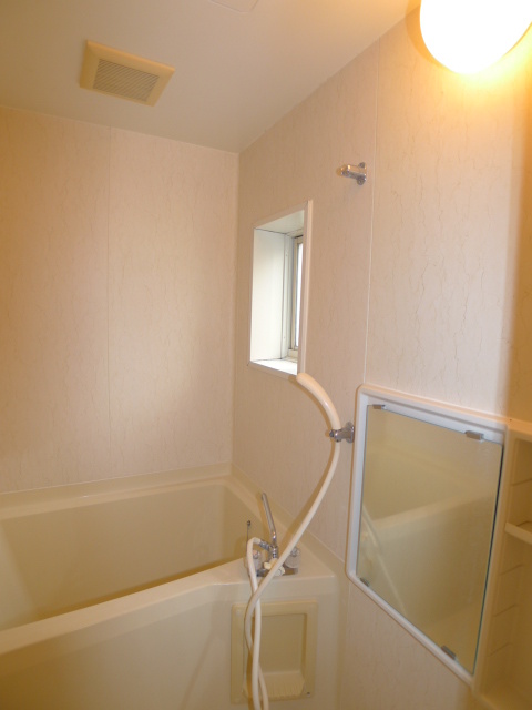 Bath. Small window with even a bath