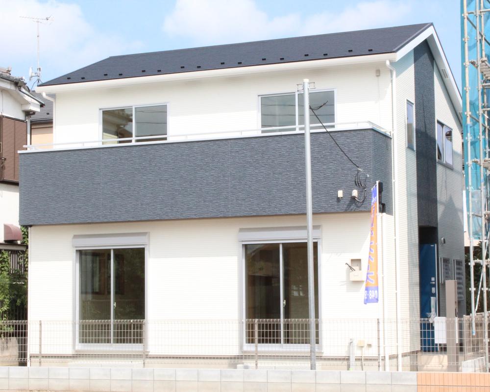 Local appearance photo. B Building: (August 2013) Shooting