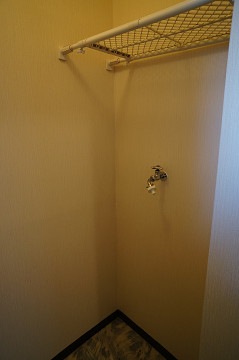 Other Equipment. Washing machine in the room