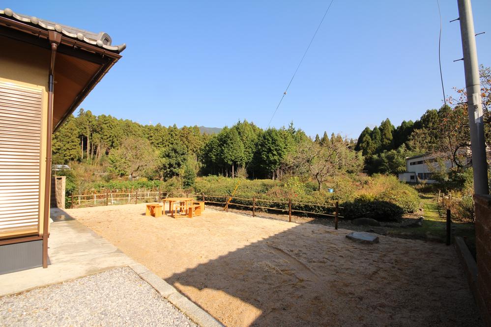 Garden. Landscape from the wood tables and garden