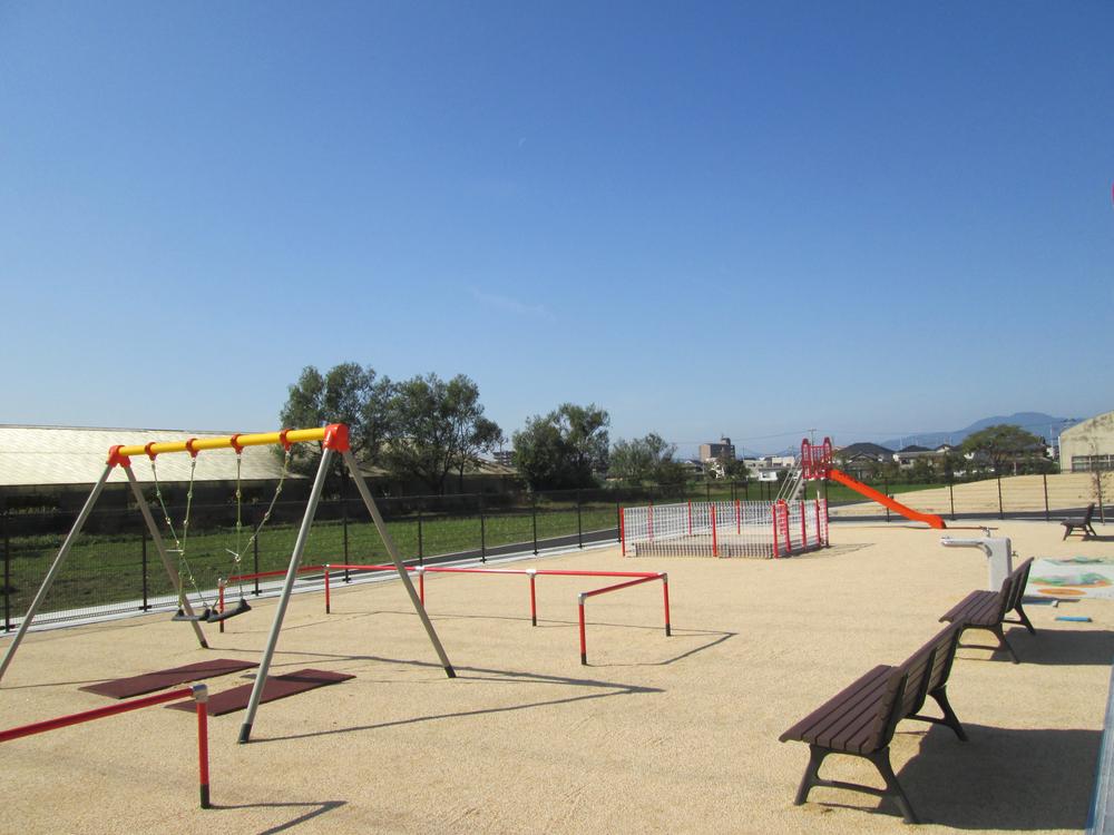 Sale already cityscape photo. Park with slides swing Sand