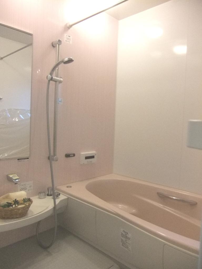 Bathroom. Bathing is coordinated in pale pink natural relaxing