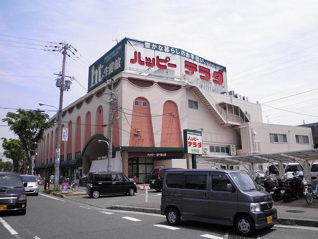 Supermarket. 680m to Happy Terada