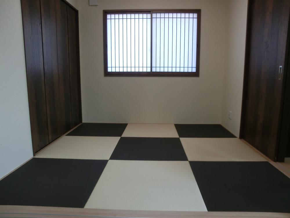 Model house photo. Model house first floor Japanese-style room is a (standard).