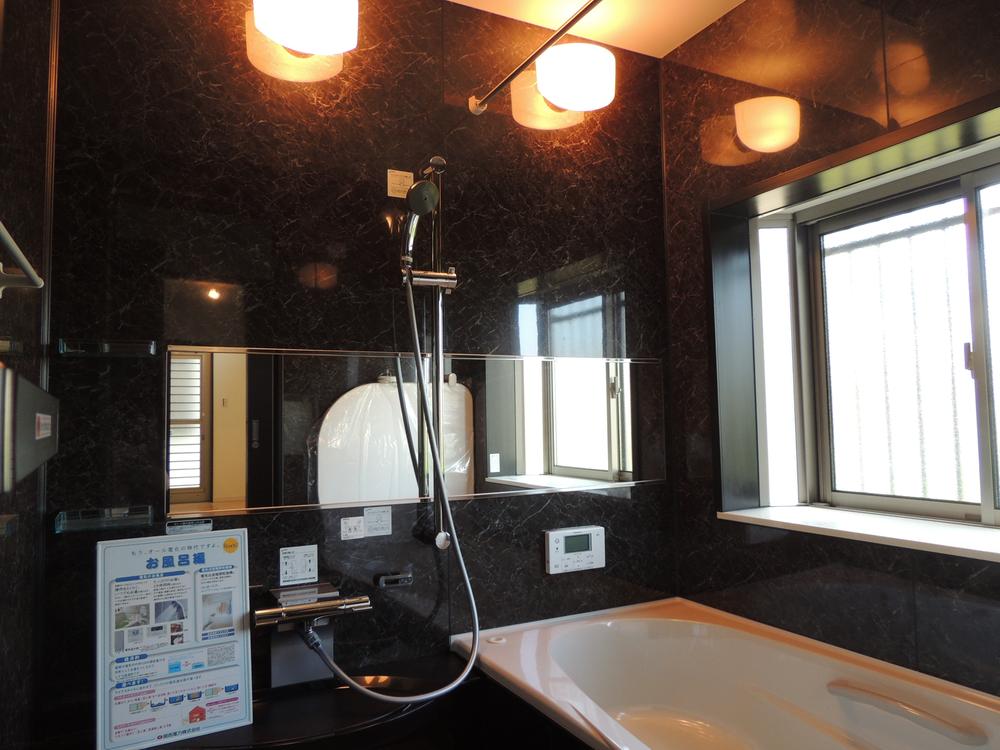 Bathroom. Bathroom which adopted the large bay windows with black panel, In the space of the room to produce a chic impression. (3-2 No. land)