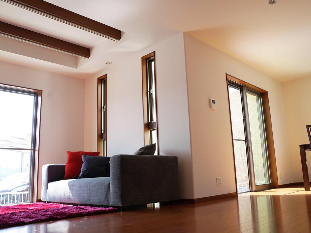 Living. The fold on the ceiling accents show design windows and beams of living. (4-5 No. land)