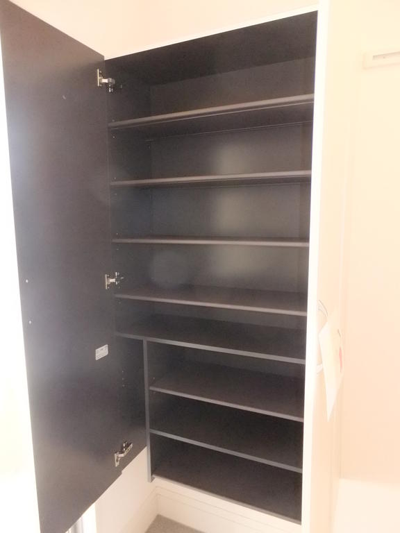 Entrance. Shoe box