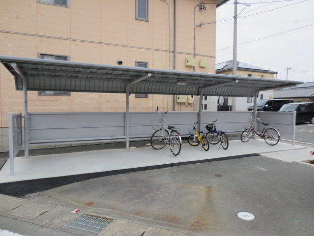 Other Equipment. Large parking lot. Garbage storage is located on the site.