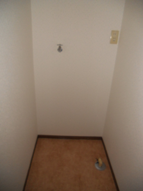 Other Equipment. Washing machine in the room