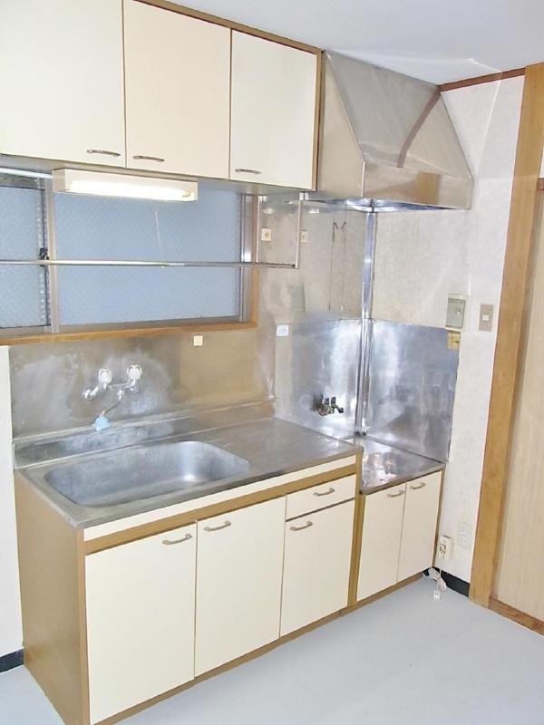 Kitchen. Bright and there is a window kitchen