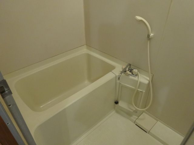 Bath. Kitchen where there is also housed in the above