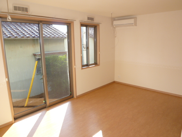 Living and room. It is a photograph of the same type