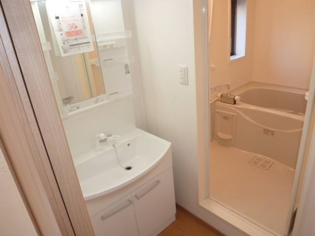 Washroom. It is a photograph of the same type