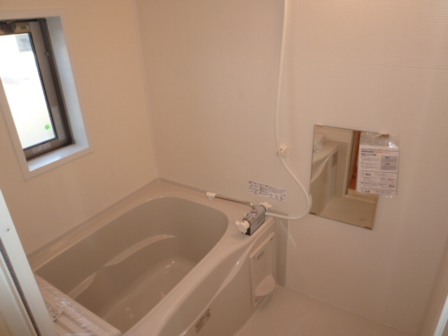 Bath. It is a photograph of the same type