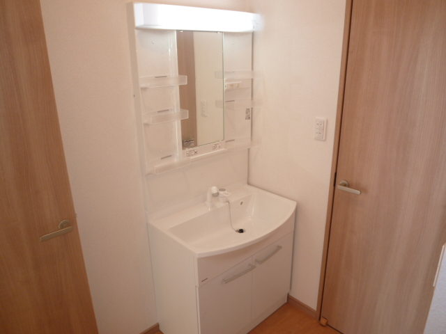 Washroom. It is a photograph of the same type