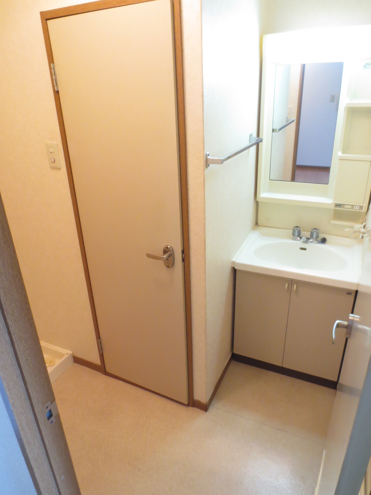 Washroom. A little look under the left-hand side is the Laundry Area.