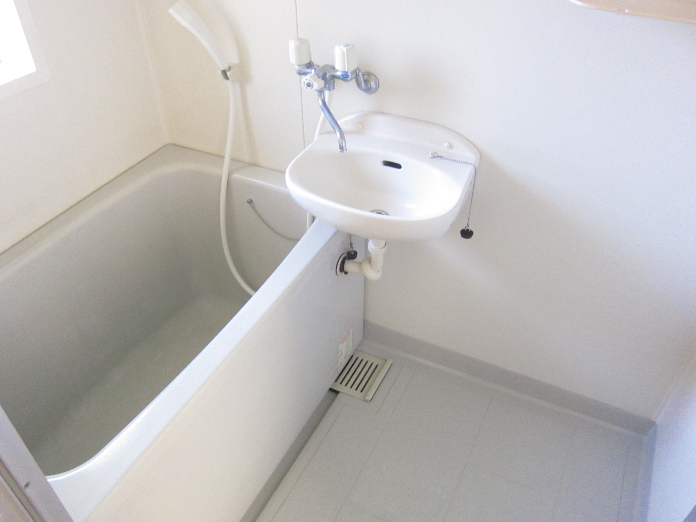 Bath. It is a simple bathroom.