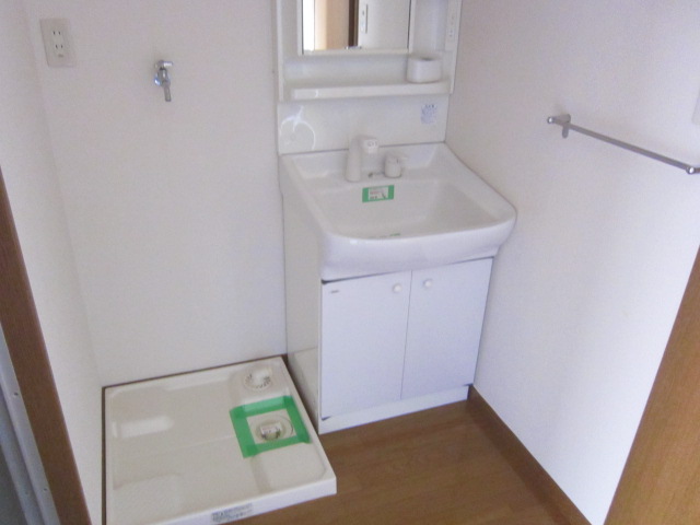 Washroom. Washing machine put in a room!