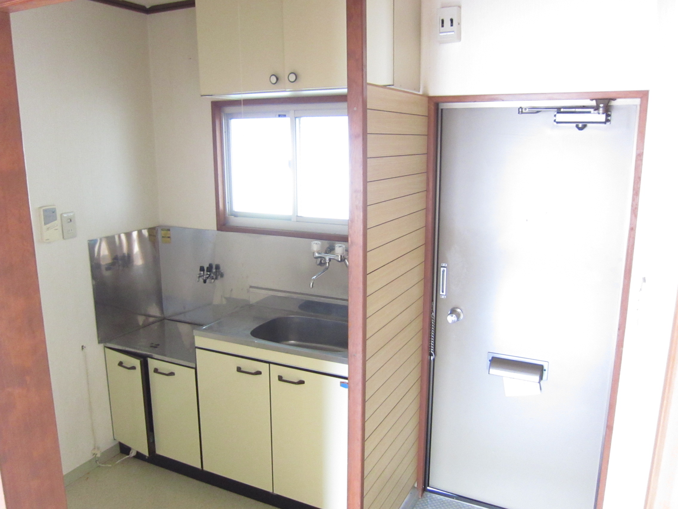 Kitchen. Is a compact kitchen window there!