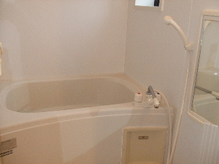 Bath. It is a bathroom to relax in a clean.