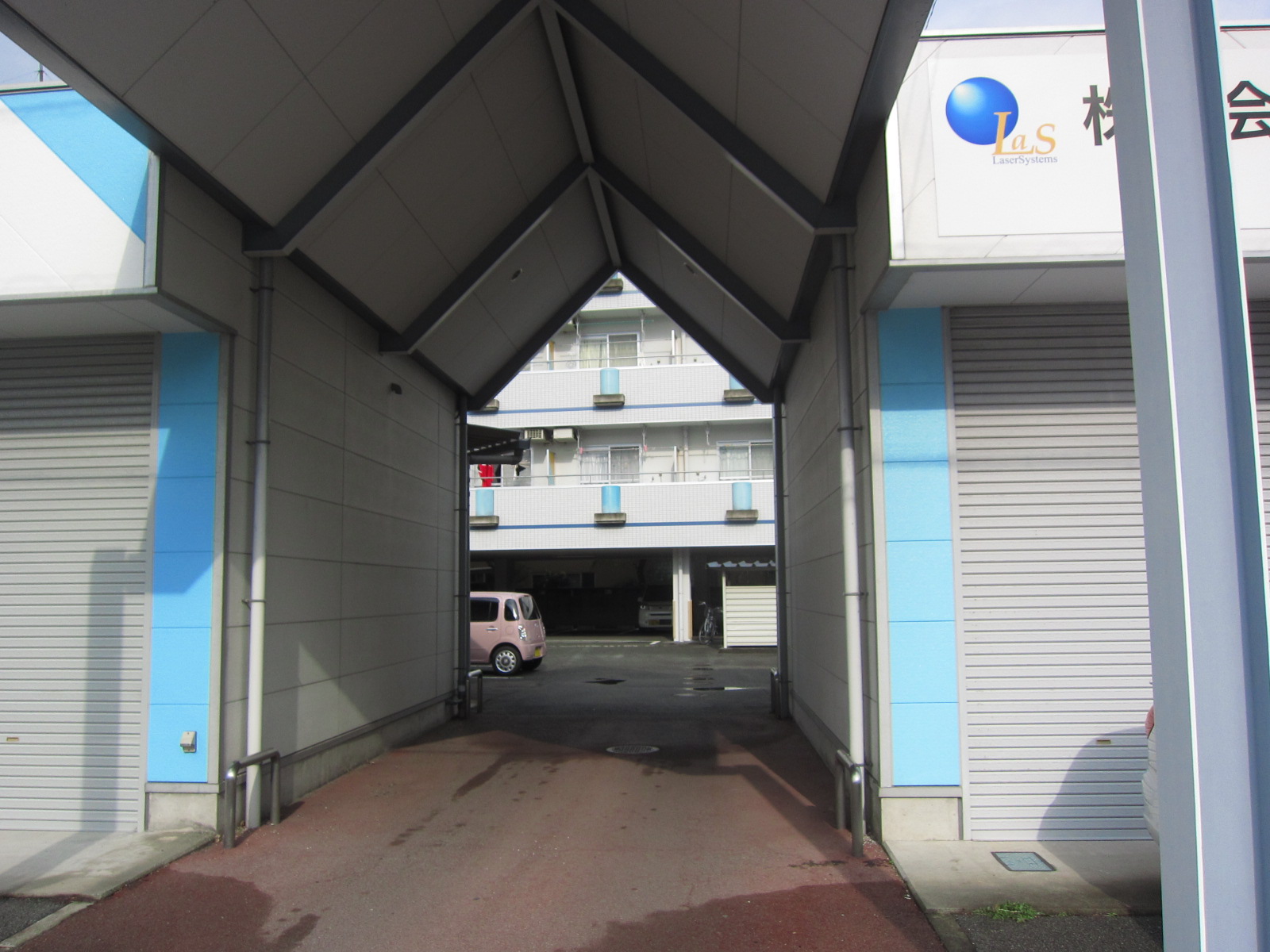 Entrance. It is located not facing the road!