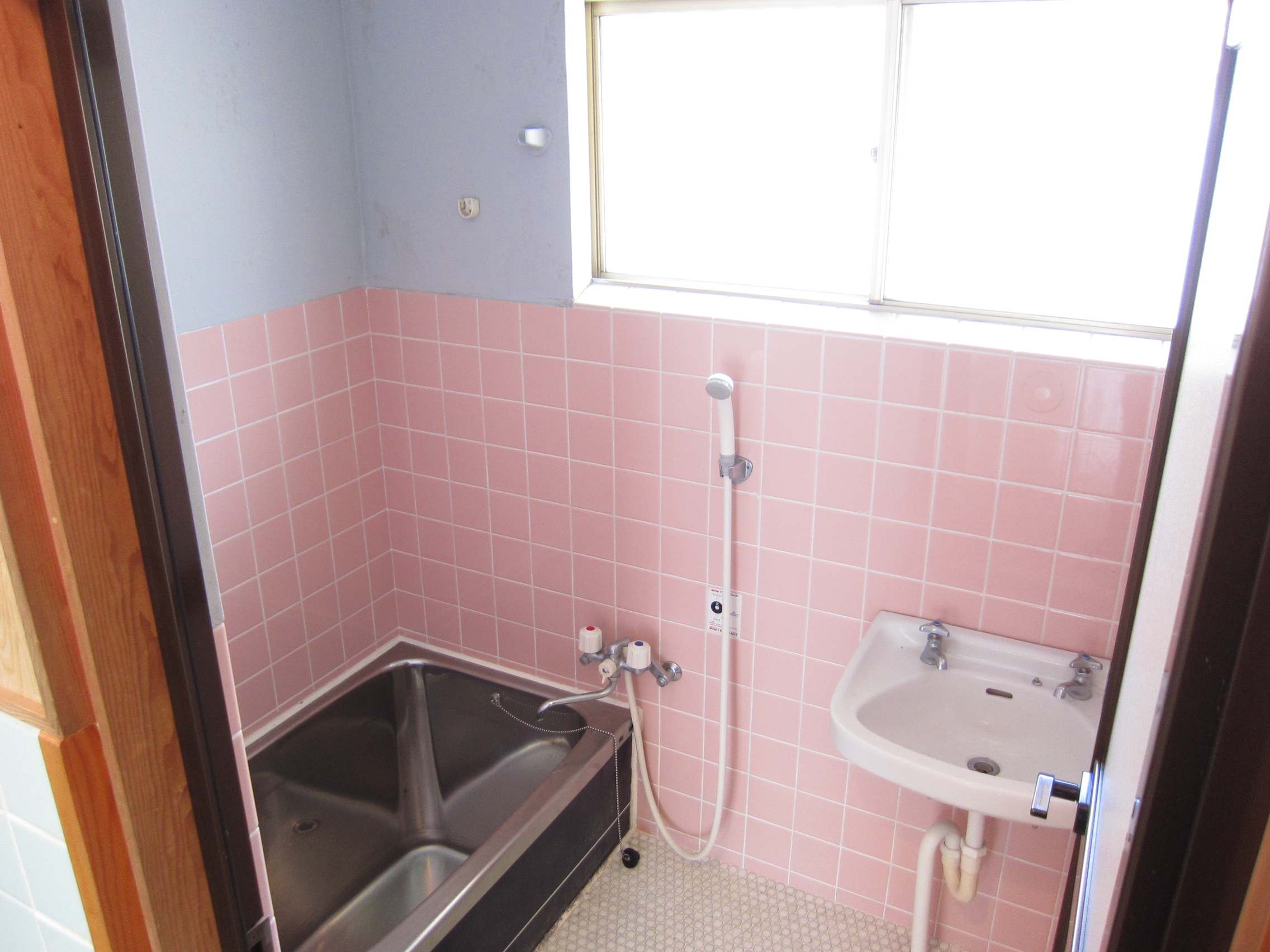 Bath. It is a bathroom with a window!