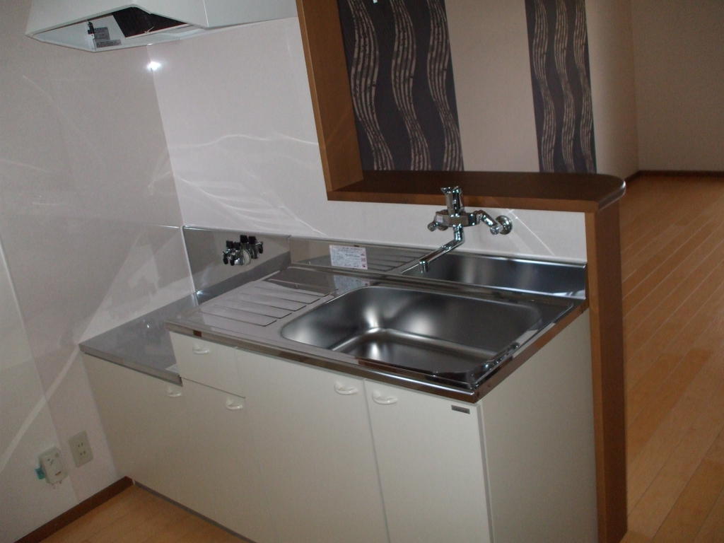 Kitchen. Bright kitchen because there is a window.