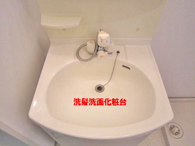 Washroom. Vanities are equipped with shower.