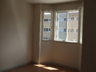 Living and room. Also impetus conversation in the corner bay window is a nice LDK.