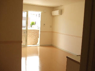 Living and room. Light Insert plenty of large windows.