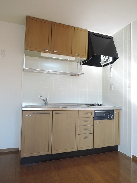 Kitchen. 2-neck is with a stove and grill.