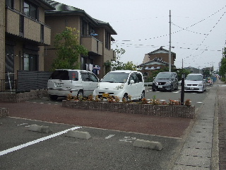 Parking lot. Spacious parking space equipped.