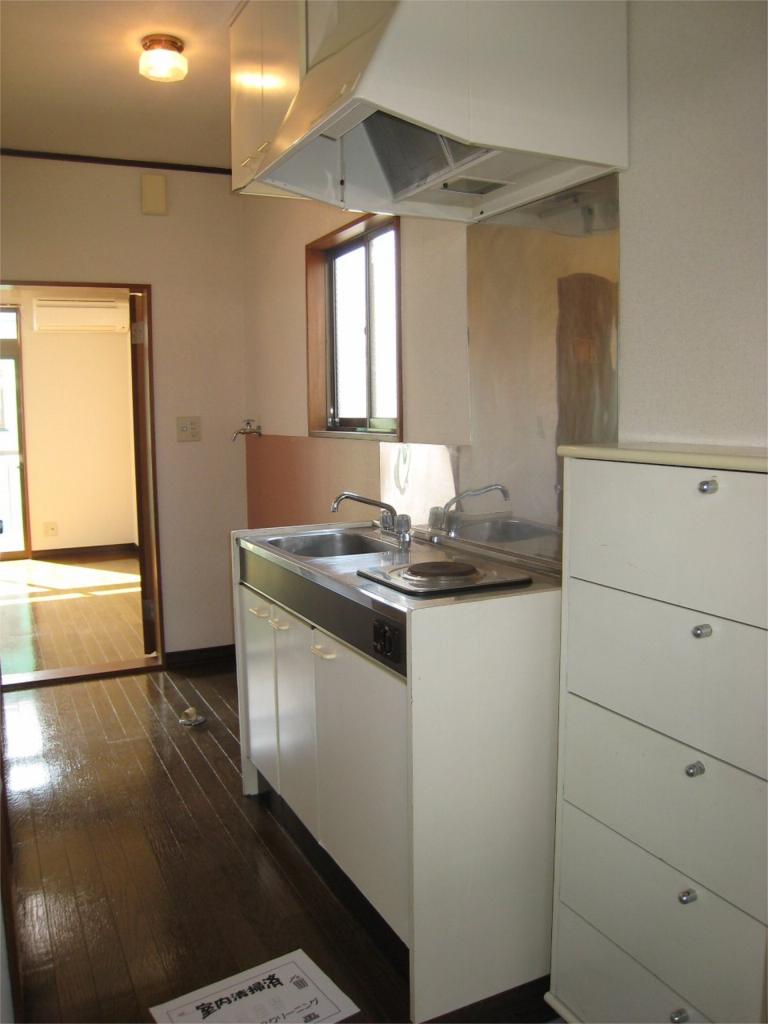 Kitchen. While compact with a minimum of function kitchen