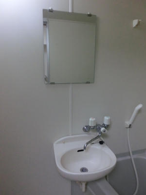 Washroom. Equipped with a wash basin in the bathroom