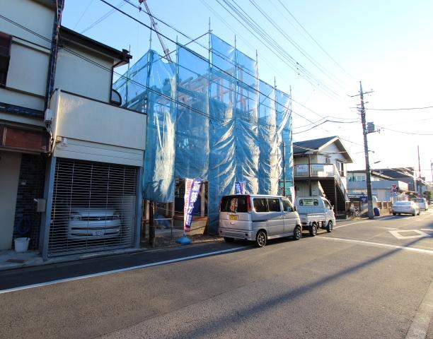 Local photos, including front road. There is a feeling of opening per corner lot.