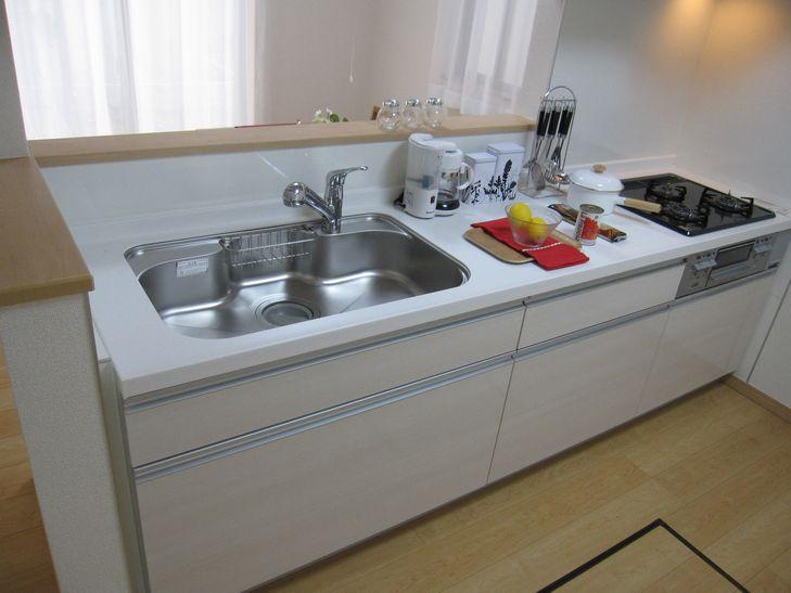 Model house photo. Popular counter kitchen