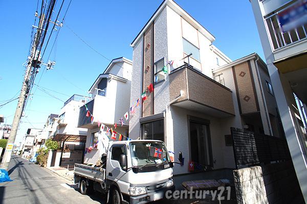 Local photos, including front road. 1 Building