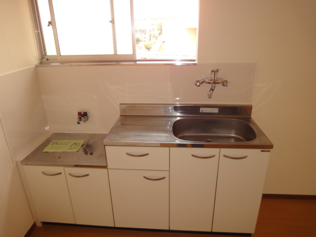 Kitchen. Put the two-burner gas stove.