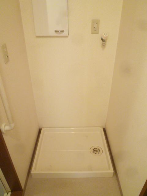 Other Equipment. Washing machine in the room